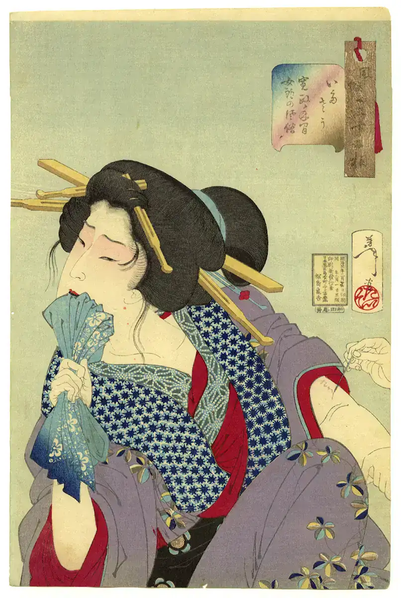 Detalle de pequeños tatuajes japoneses irebokuro, puntos y kanjis amorosos
